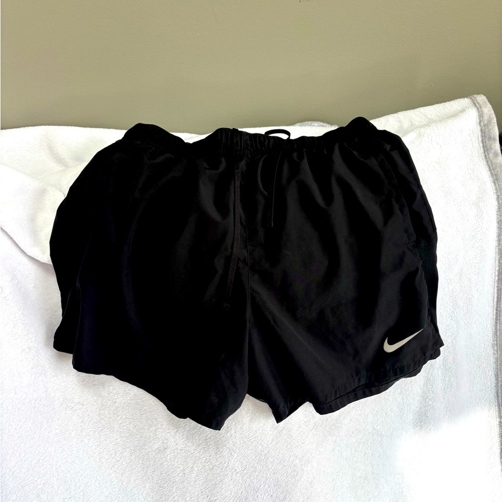 Men’s Size Medium black Nike running shorts.